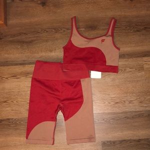 Fabletics sports bra and biker shorts! Tags still on.  Both size medium.